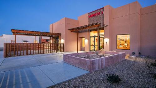 Entrance with outdoor seating